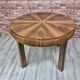 Walnut extendable round table after professional restoration. Art deco.