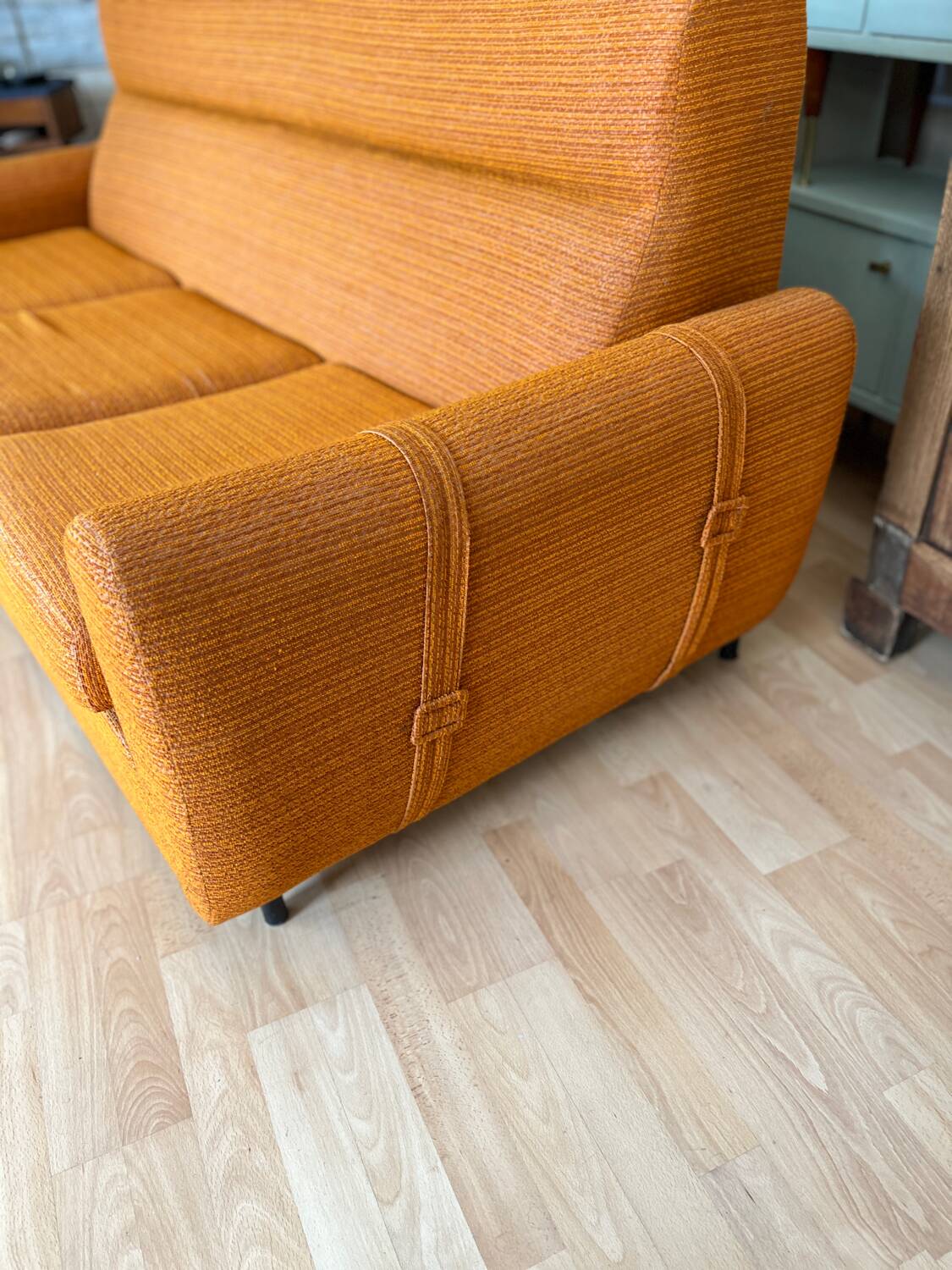 Vintage orange convertible sofa