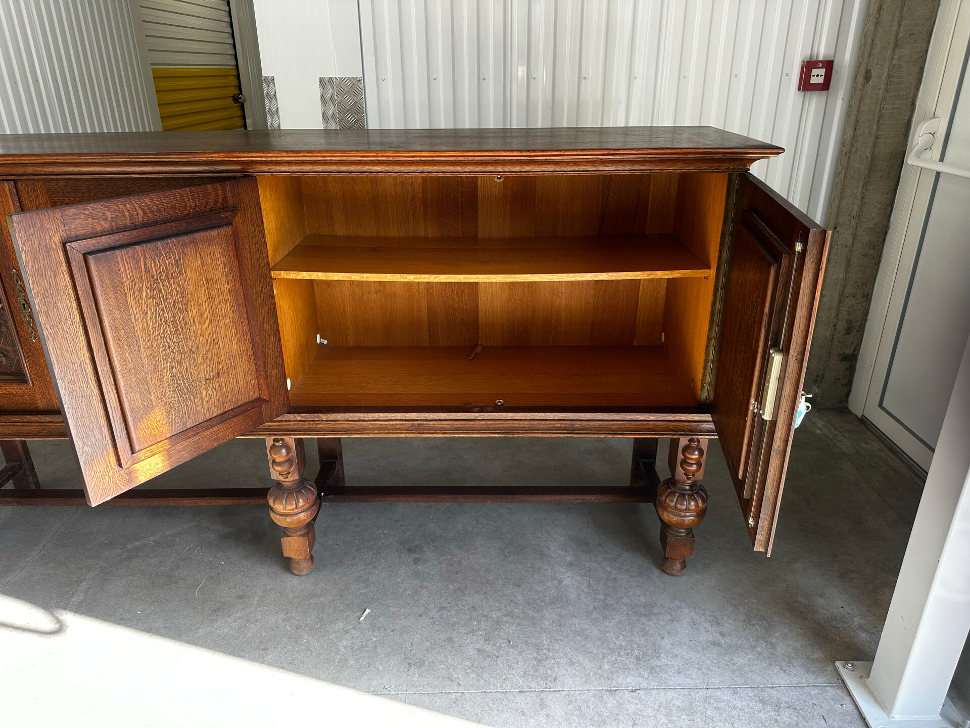 Large carved oak buffet in neo-Renaissance style, mid-20th century.