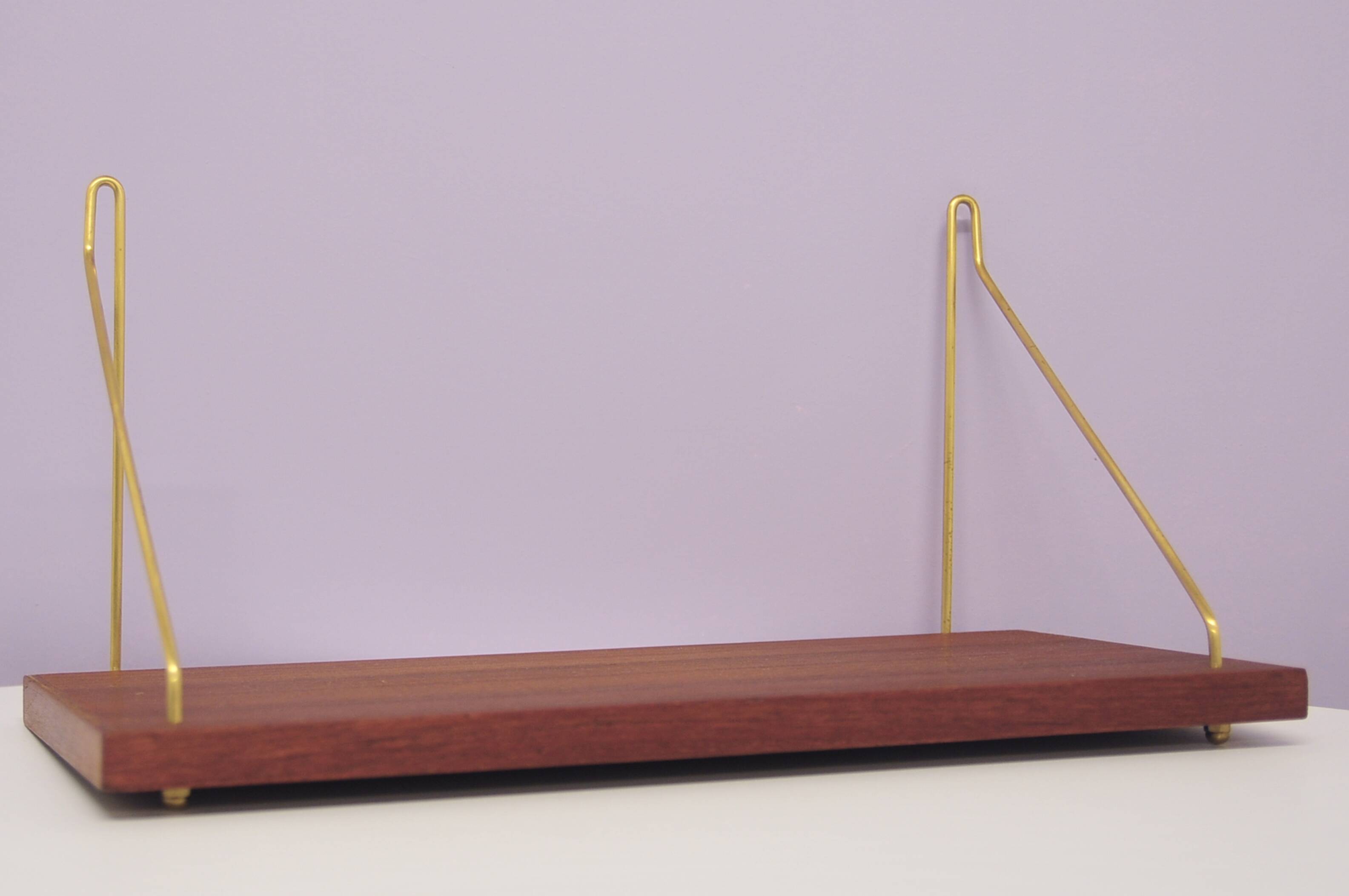 Danish vintage teak wall shelf brass supports