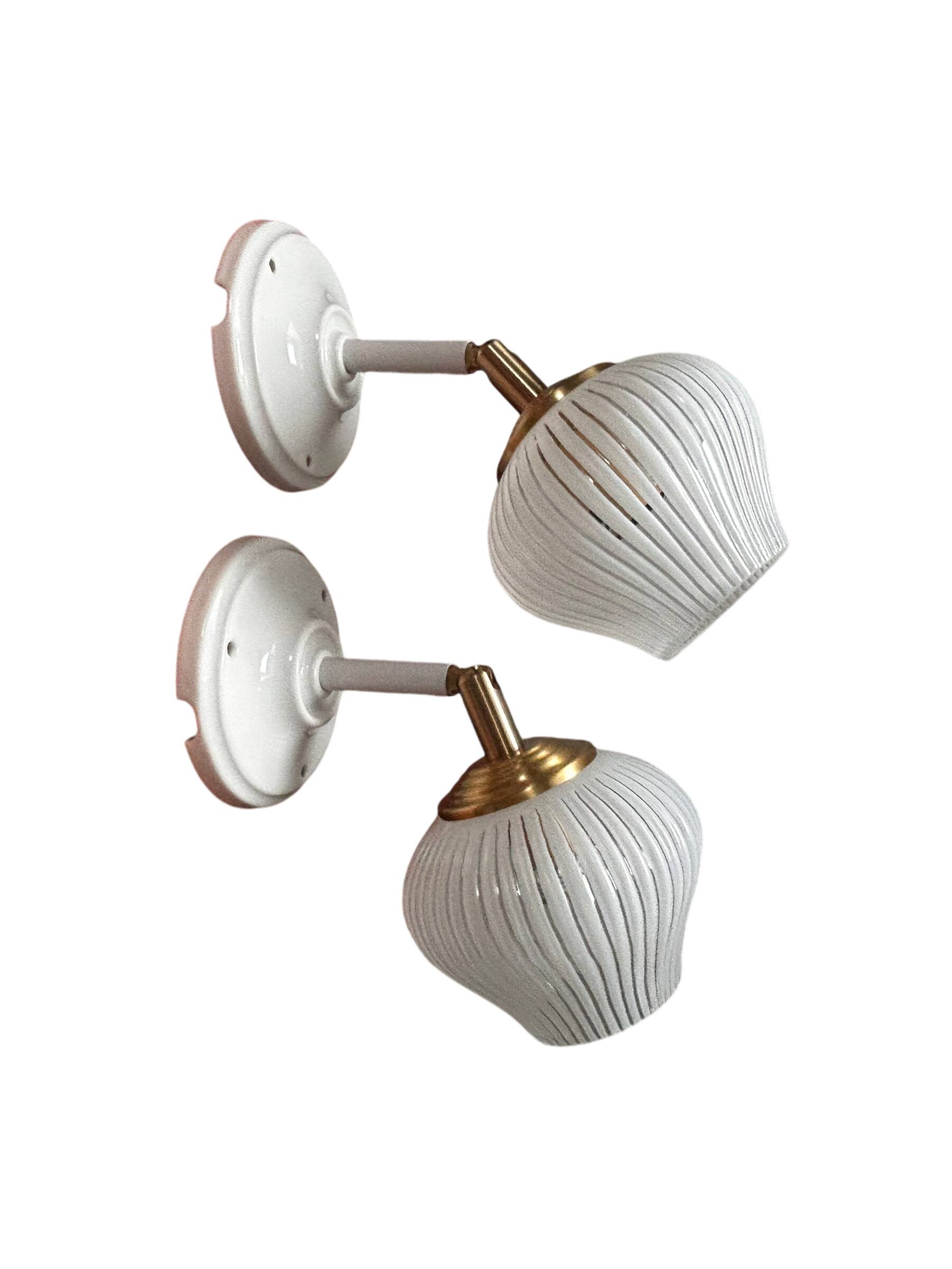 Pair of vintage white globe tilting wall sconces