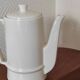Small coffee maker with floral decoration