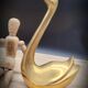 Pair brass swans