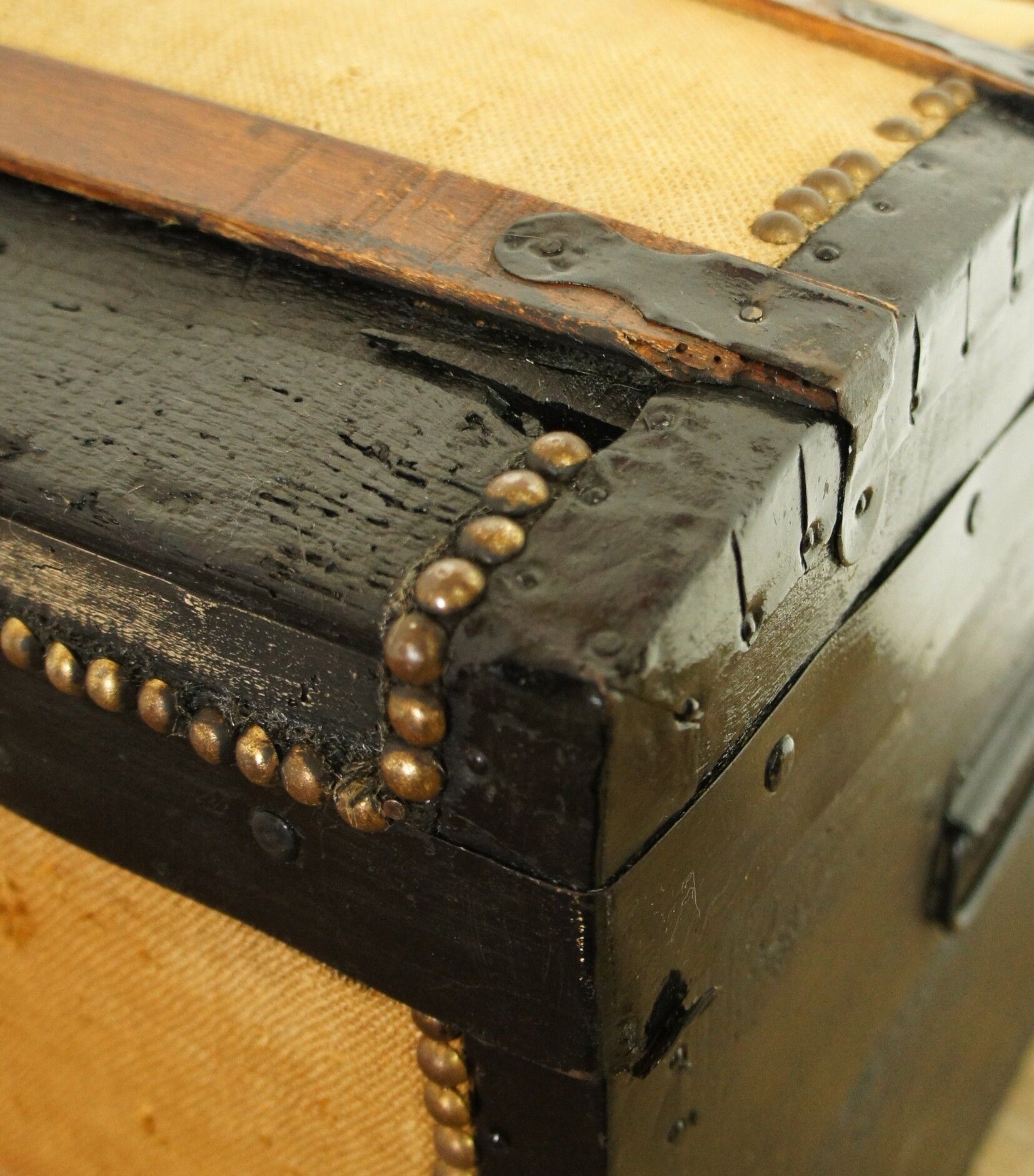 Old-curved wooden trunk - burlap