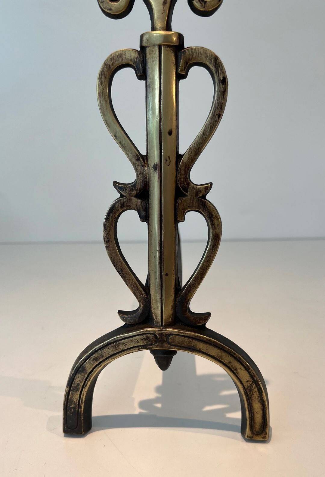 Pair of Brass and Wrought Iron Chenets with Triple Volute and Mount Torch Holders