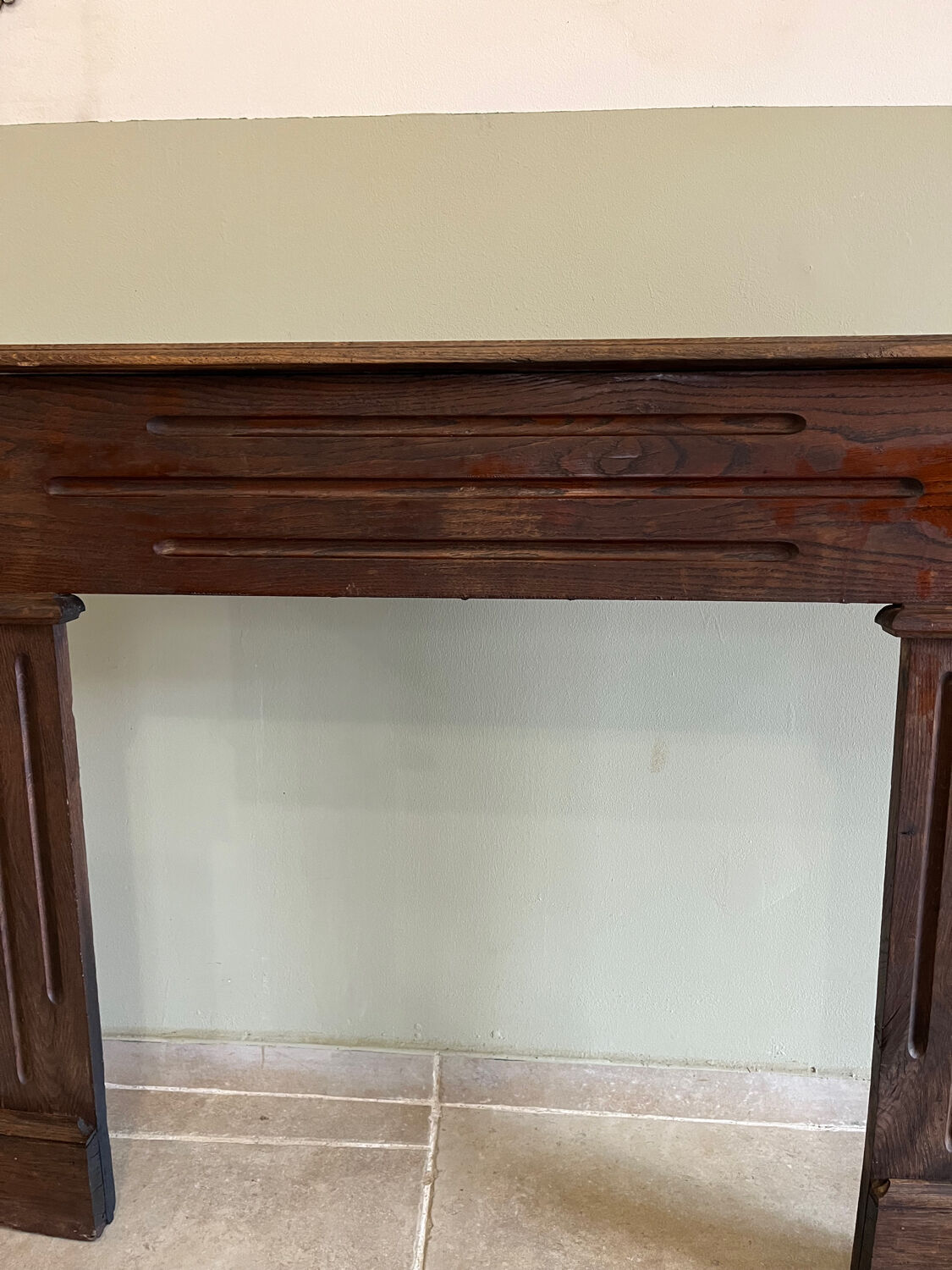 Antique wooden fireplace mantel