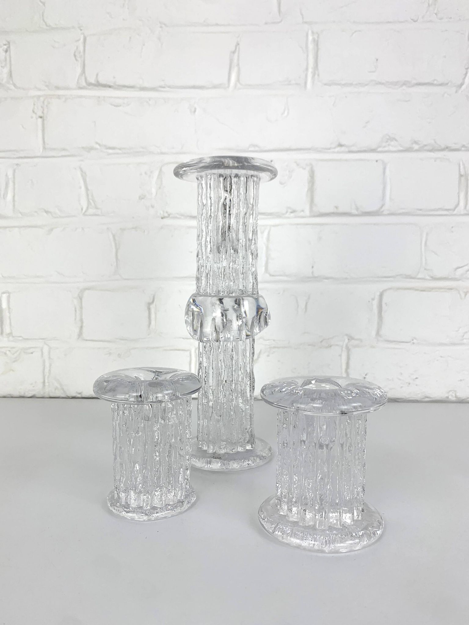 Glass candle holders by Göran Wärff for Kosta Boda, Sweden, 1970s.