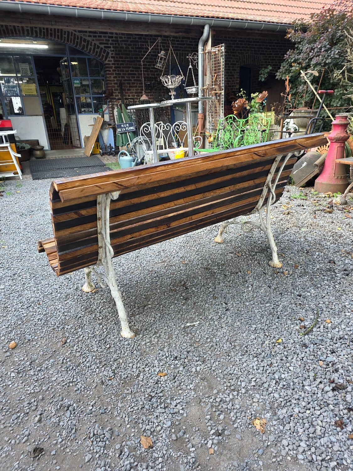 Cast iron and oak slatted garden bench