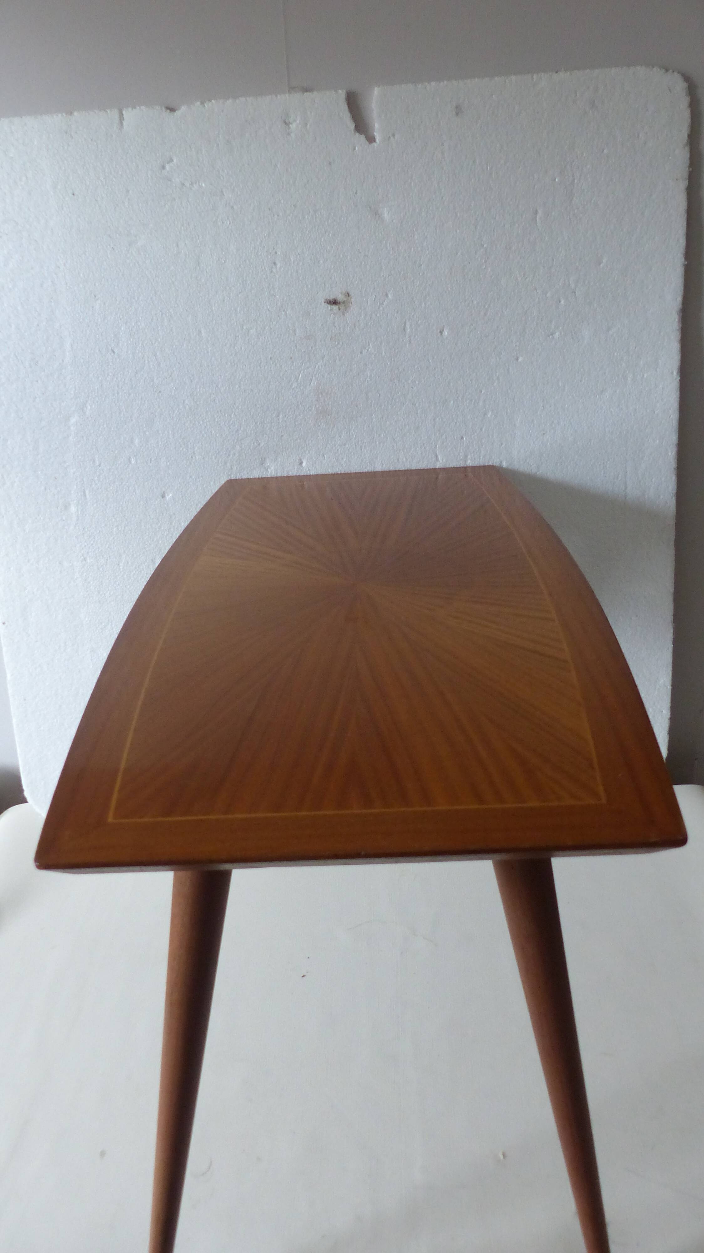 Coffee table with compass legs