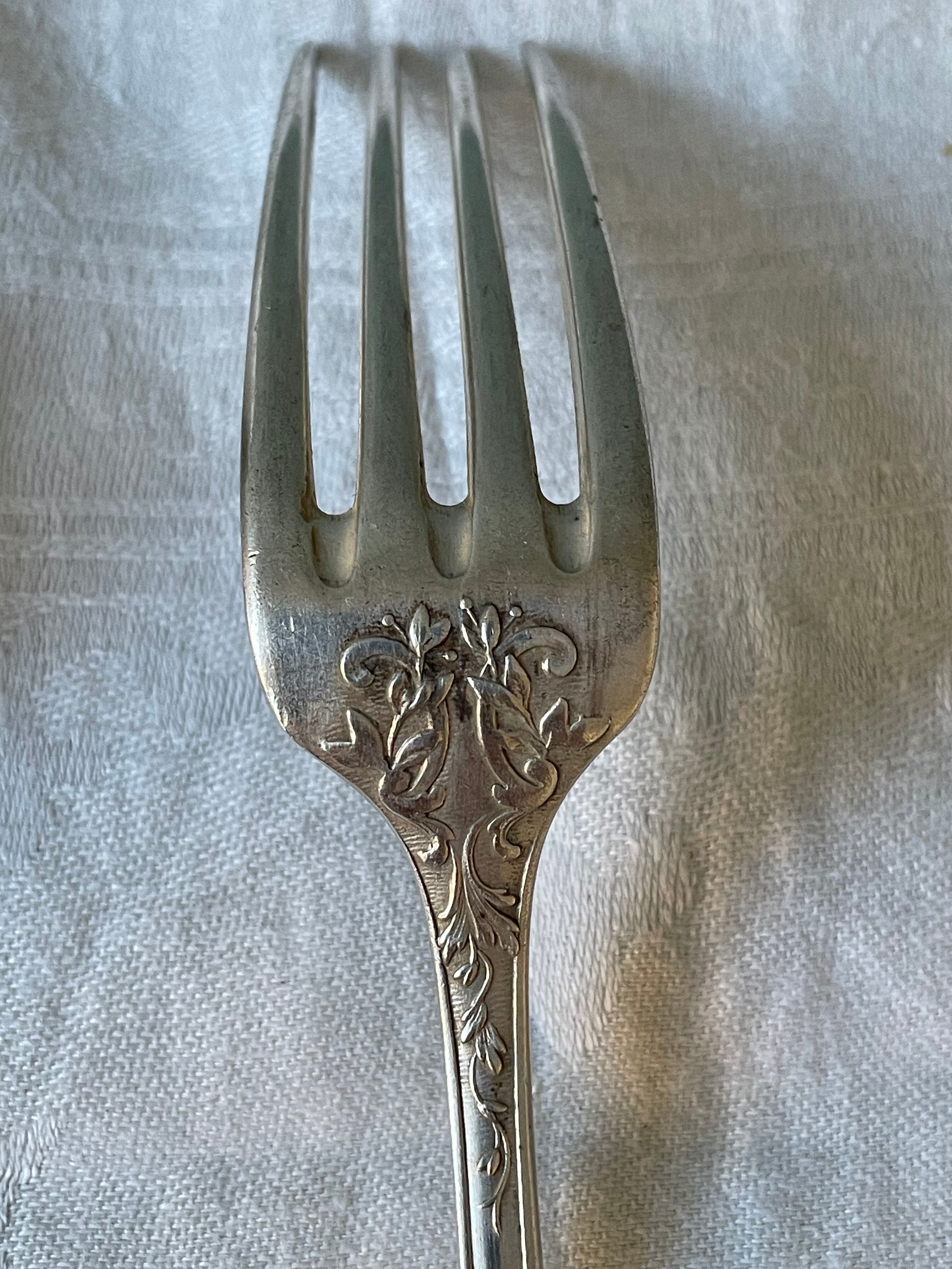 Series of 21 antique silver metal table forks