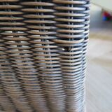 2 armchairs in woven rattan and wood, 1980s