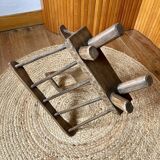 Brutalist magazine rack in the style of Jean Touret, 1950s.