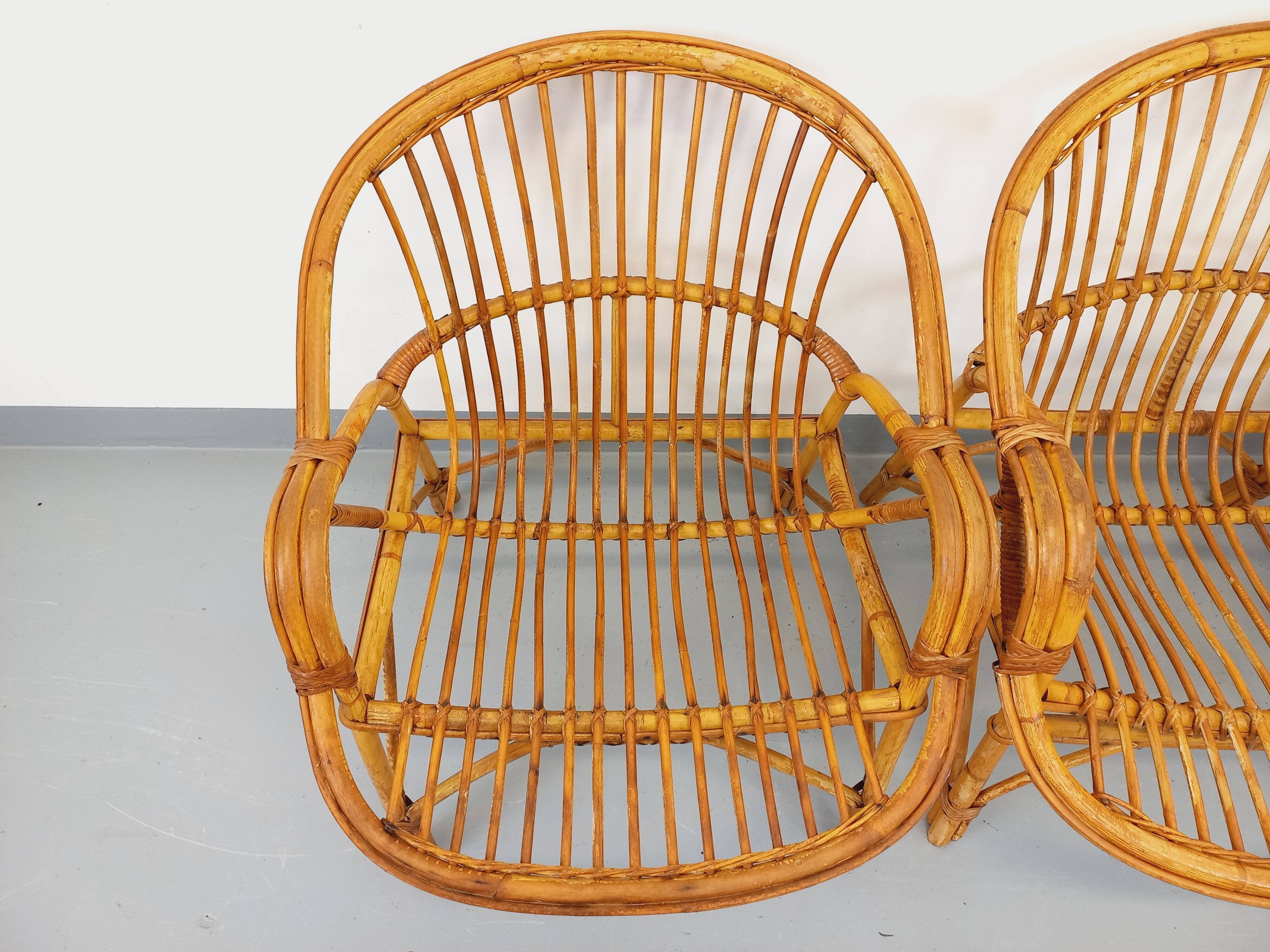 Set of 4 vintage rattan armchairs from the 60s