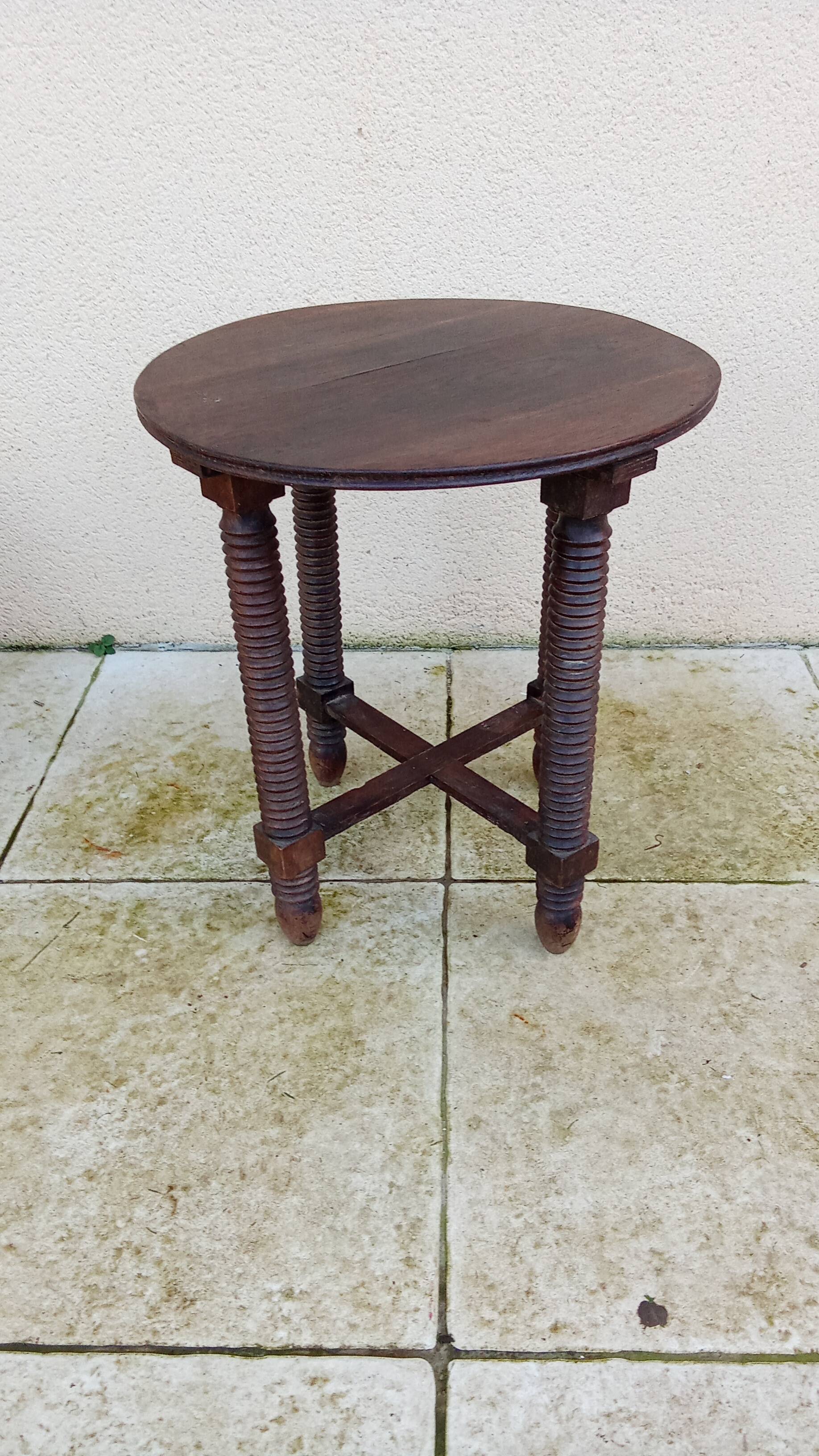 Old small round side table in Dudouyt style