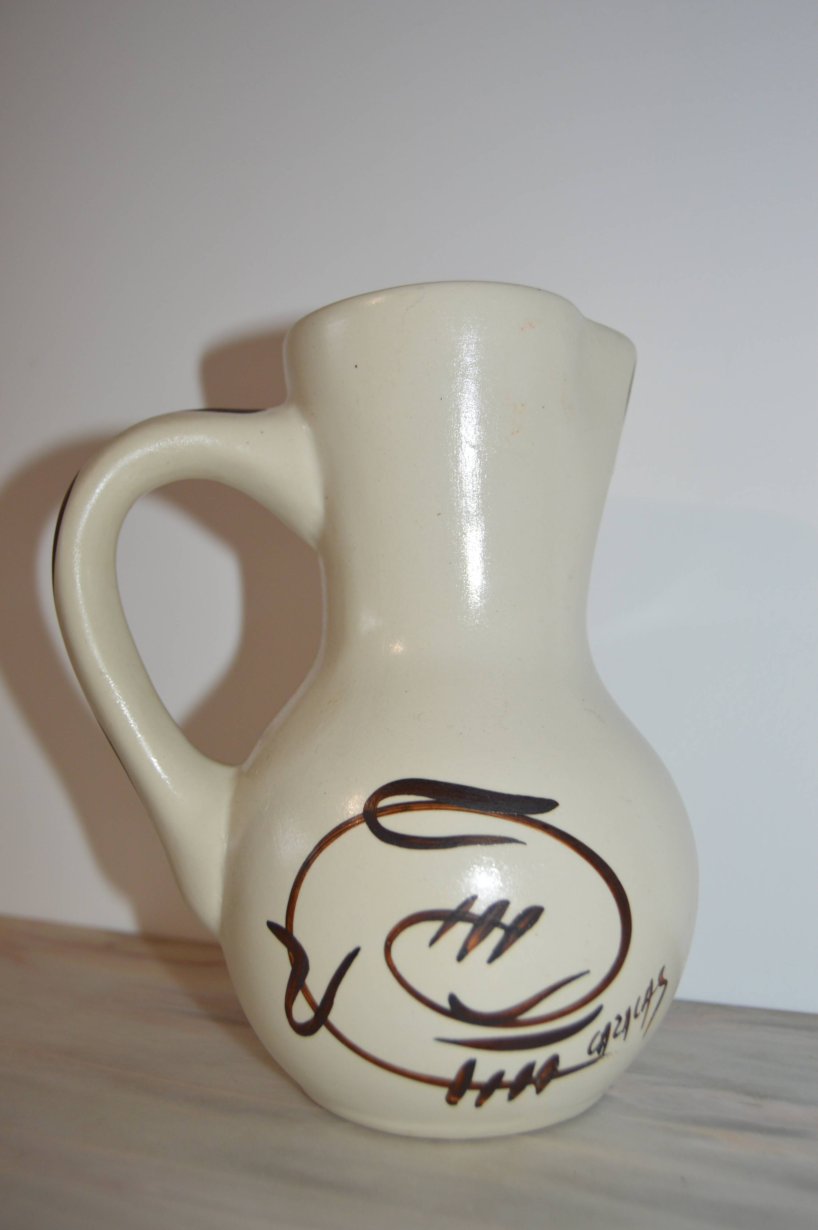 Ceramic pitcher signed Cazalas