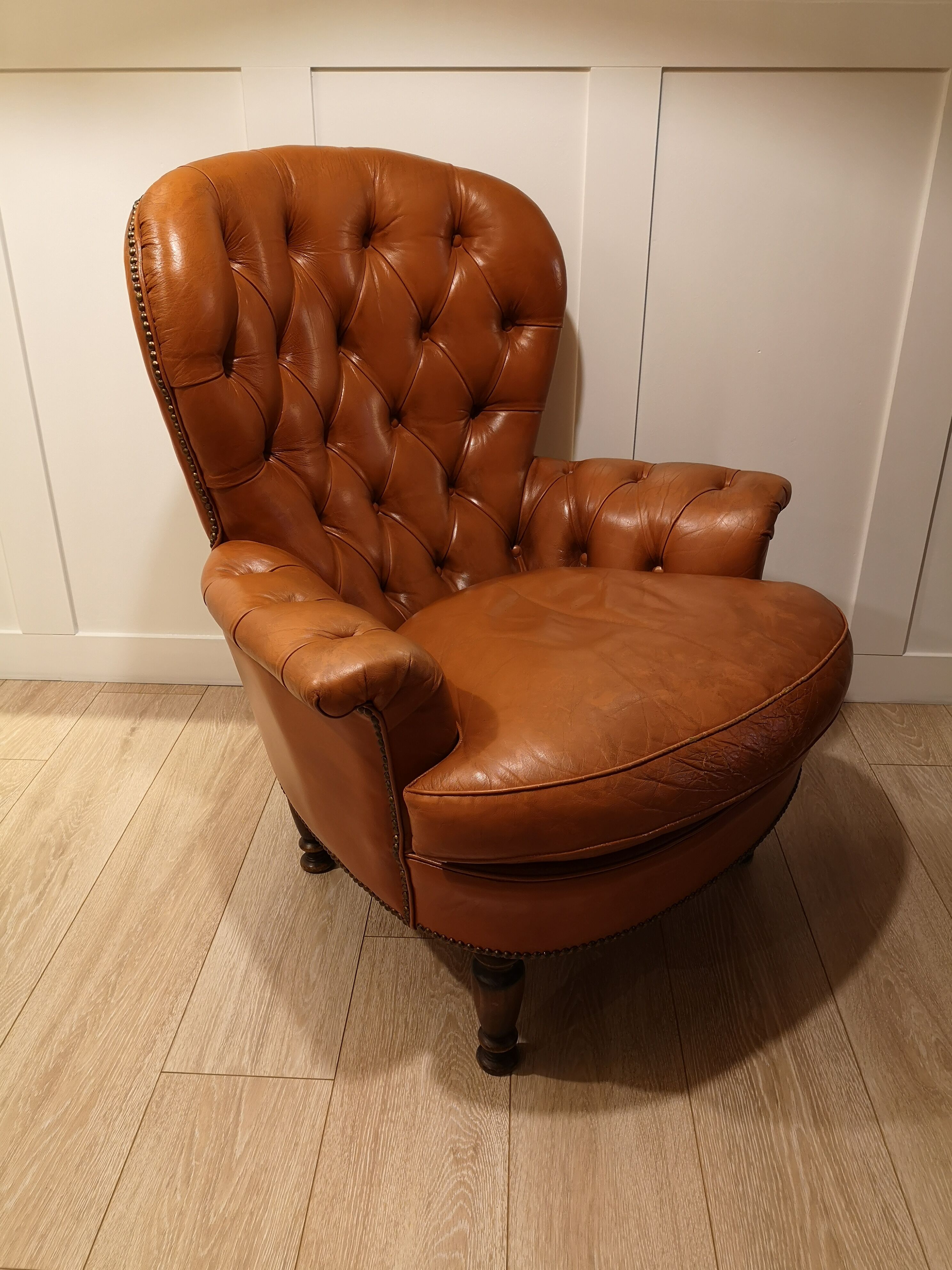 Pair of leather chesterfield chairs