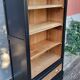 Two-tone black and honey bookcase