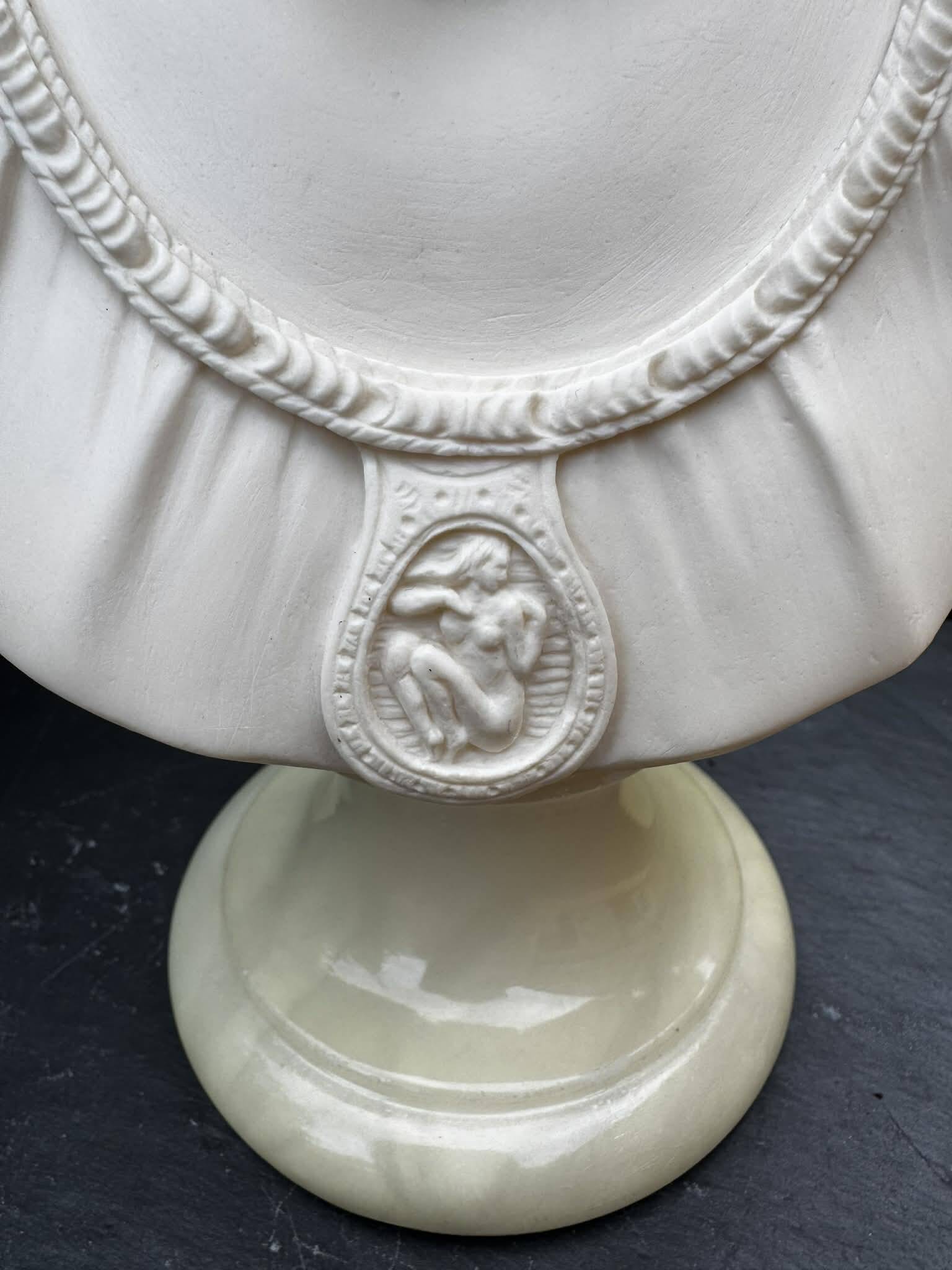 Alabaster bust of a woman signed Arnaldo Giannelli dated 1980.