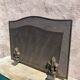 Fireplace screen in metal with cast iron fleur-de-lis.