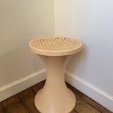 Tam Tam Stamp stool Made in France with a woven rattan-style seat.