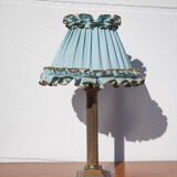 Brass lamp with vintage blue laminated lampshade