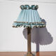 Brass lamp with vintage blue laminated lampshade