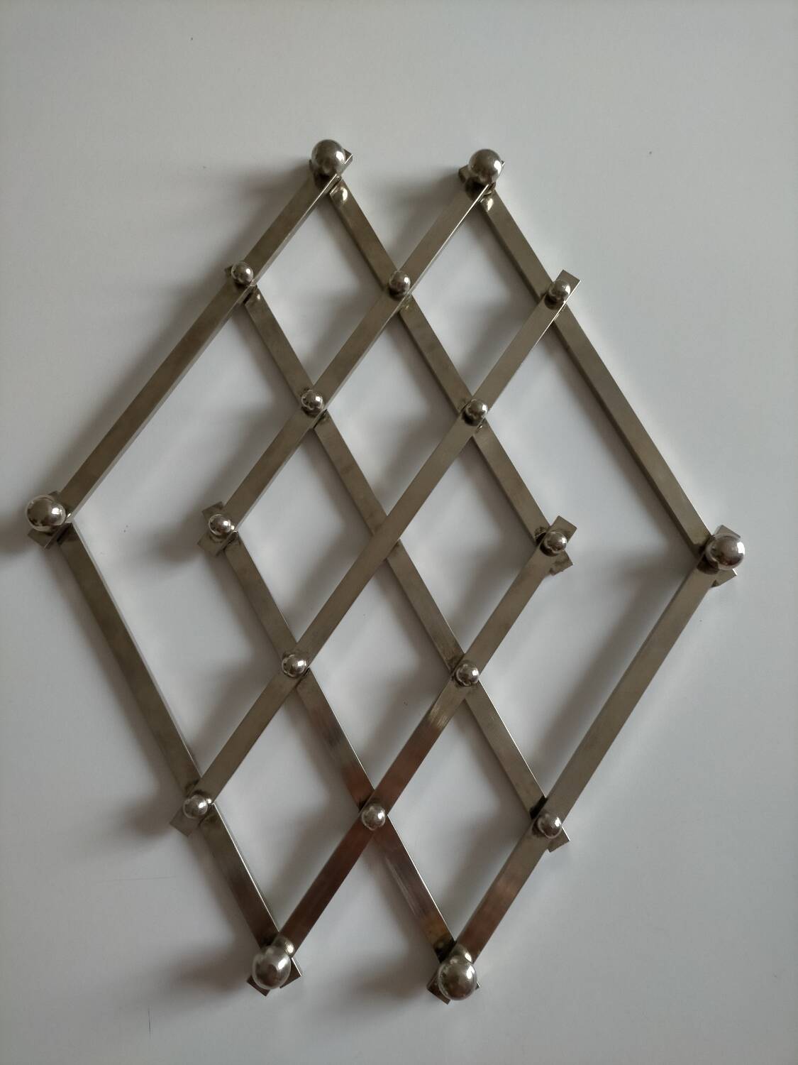 Jacques Adnet metal trivet in very good condition