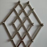 Jacques Adnet metal trivet in very good condition