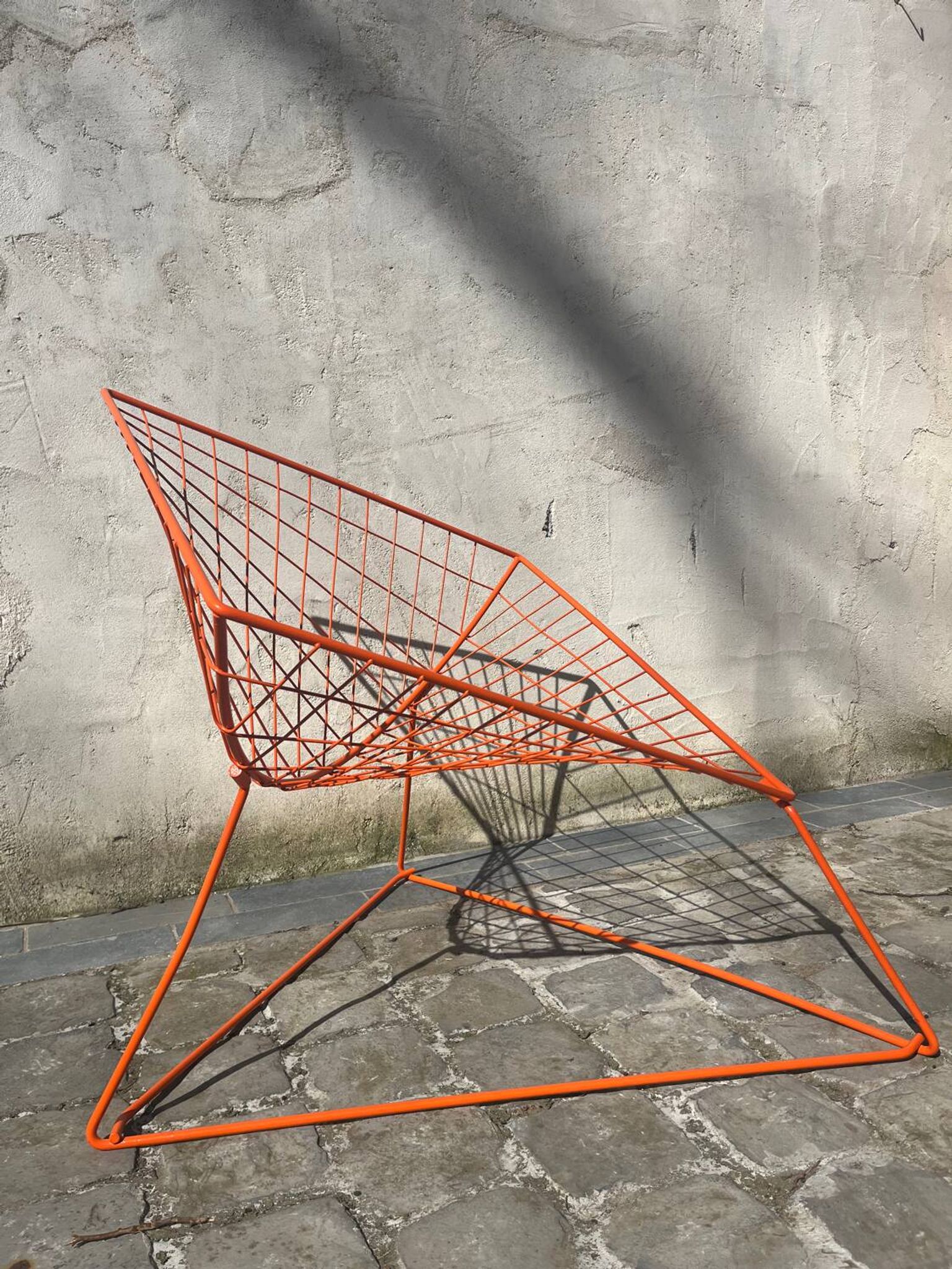 Orange lattice armchair