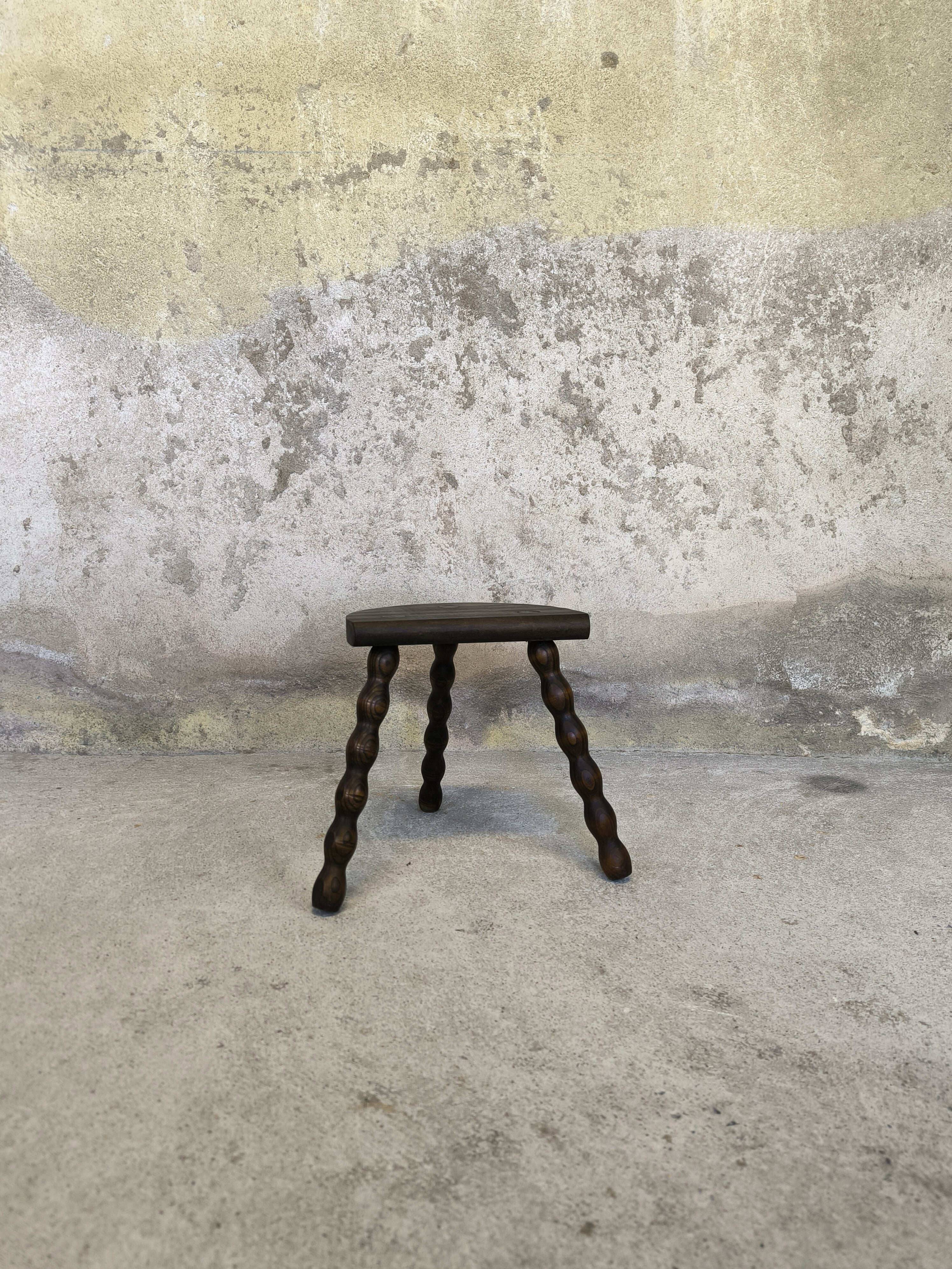 Vintage tripod stool with beaded legs