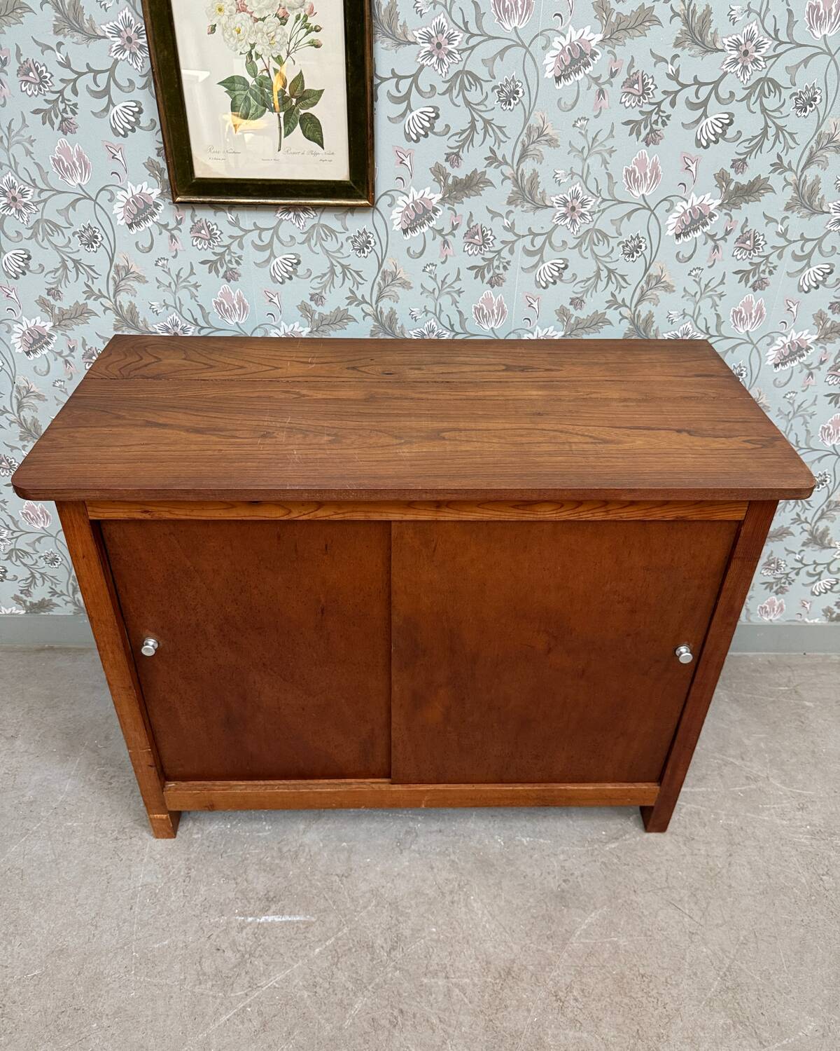 Vintage sideboard with sliding doors