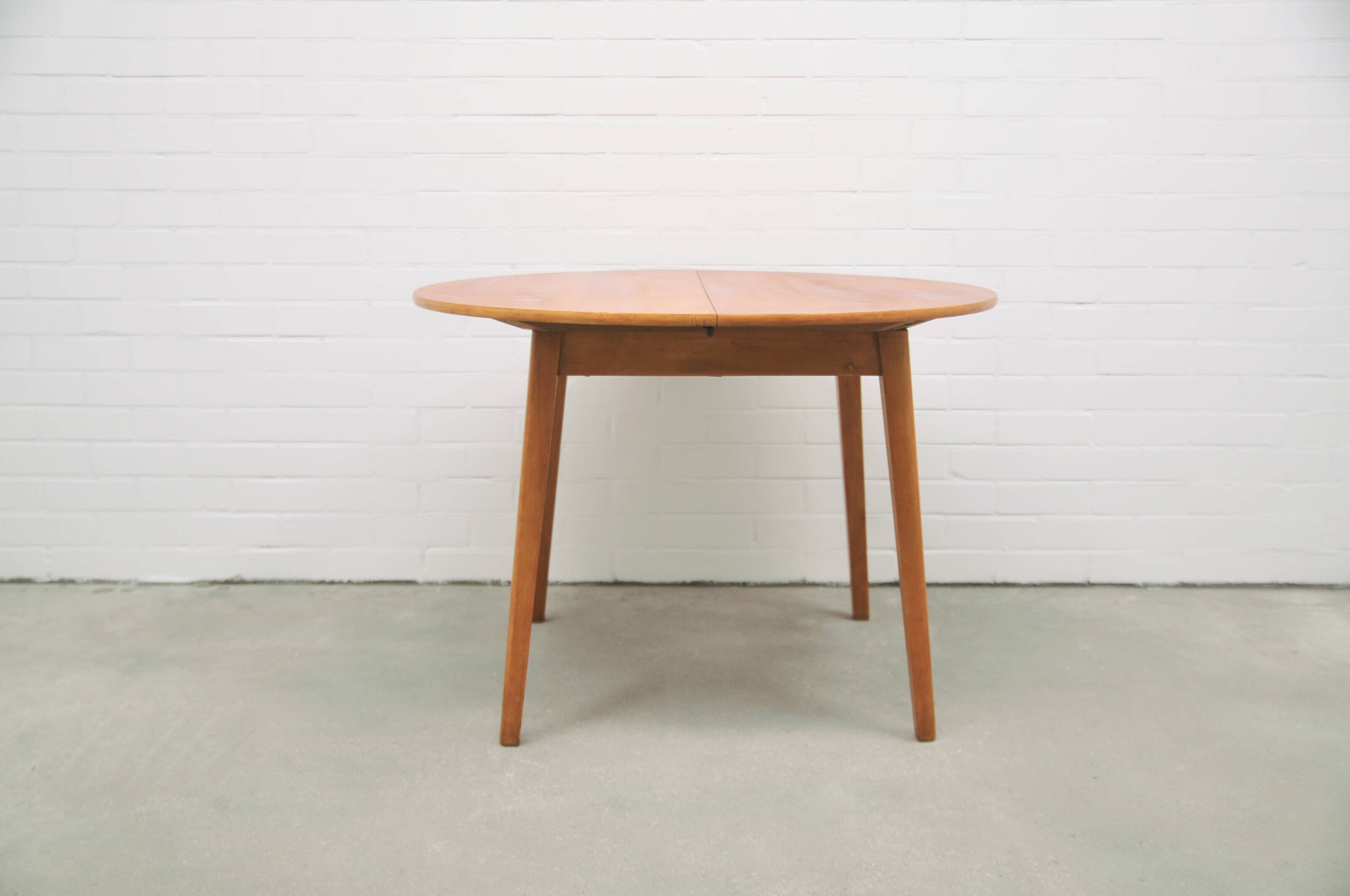 vintage round fold-out dining table