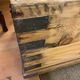 Old trunk in natural pine wood with padded interior