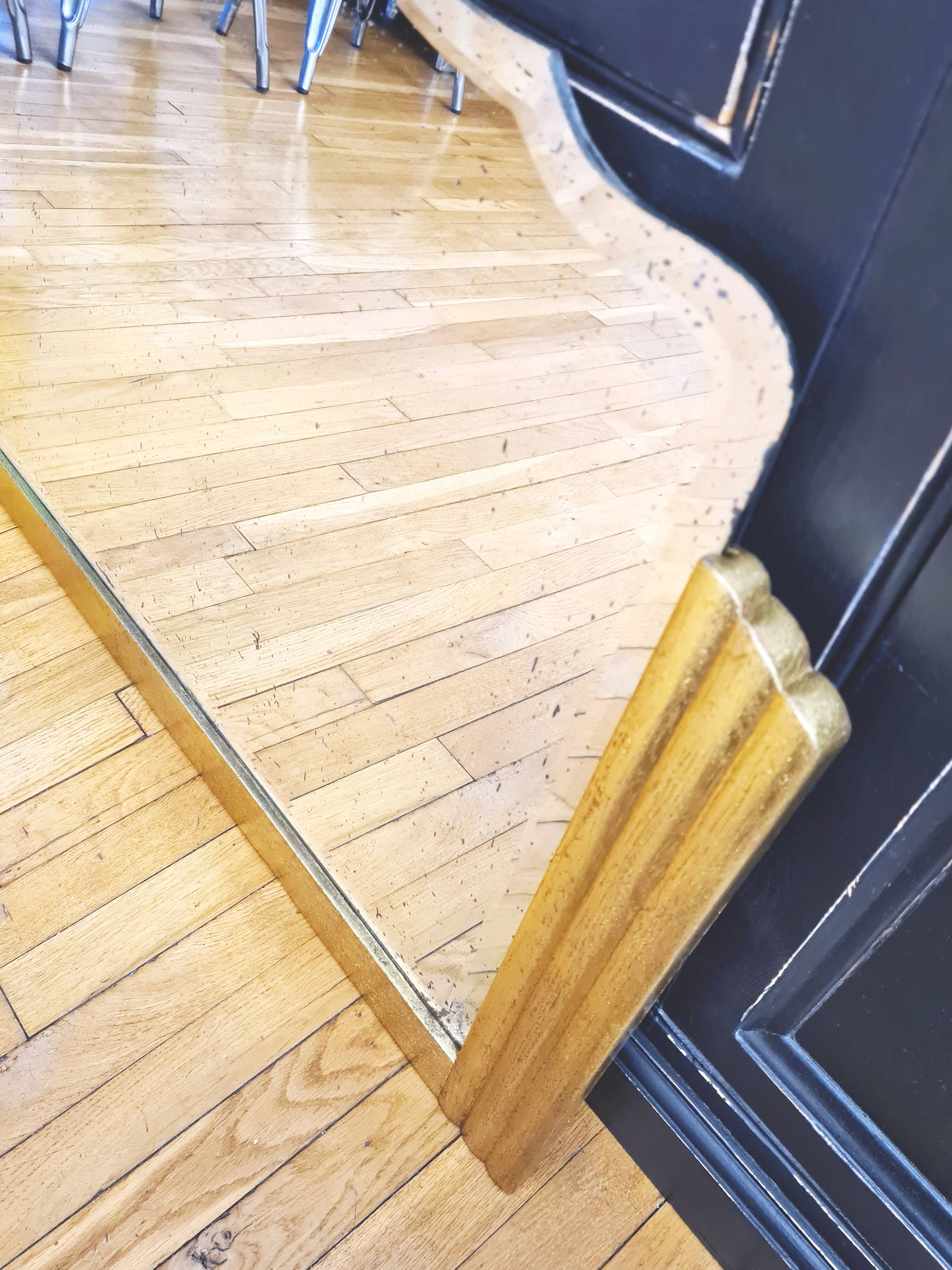 Antique large beveled mercury pediment mirror, art deco, gilded with leaf.