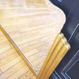 Antique large beveled mercury pediment mirror, art deco, gilded with leaf.