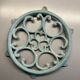 Old cast iron trivety turquoise