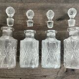 Set of 4 molded crystal bottles – Val Saint Lambert