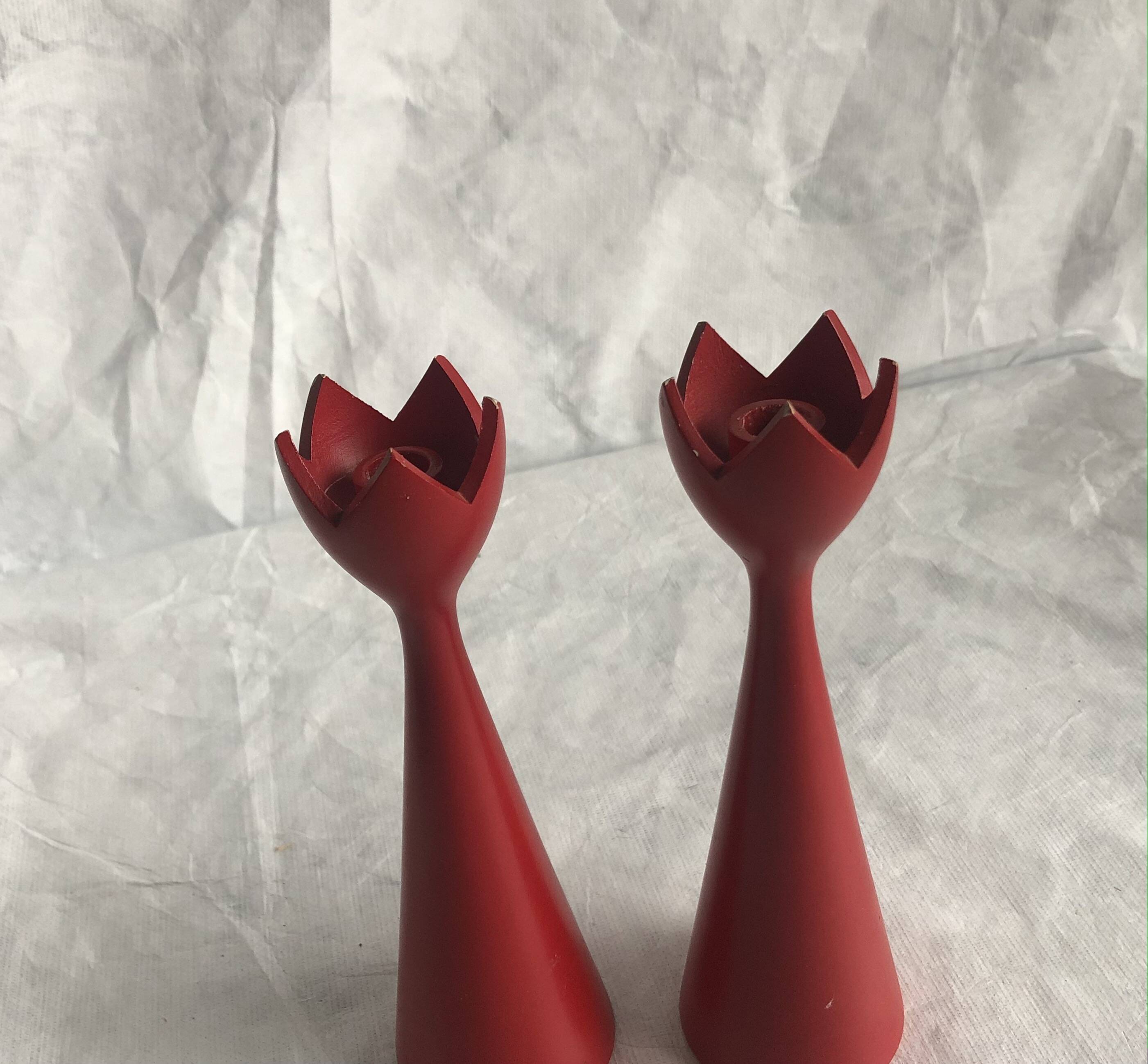 pair of Scandinavian painted wooden candle holders, minimalist atmosphere, free form