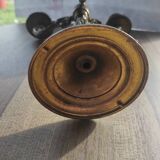 Sculpted candle holder with 3 bronze branches