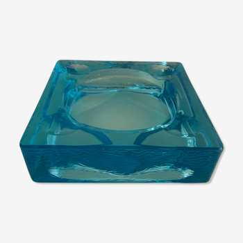 Ashtray paved in blue glass