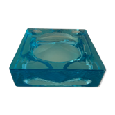 Ashtray paved in blue glass