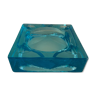 Ashtray paved in blue glass