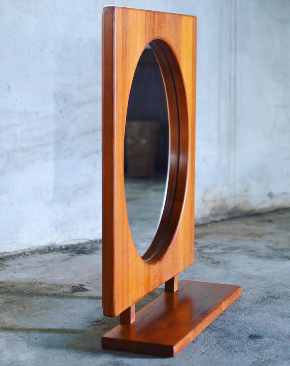 Round wall mirror with teak shelf by Pedersen & Hansen