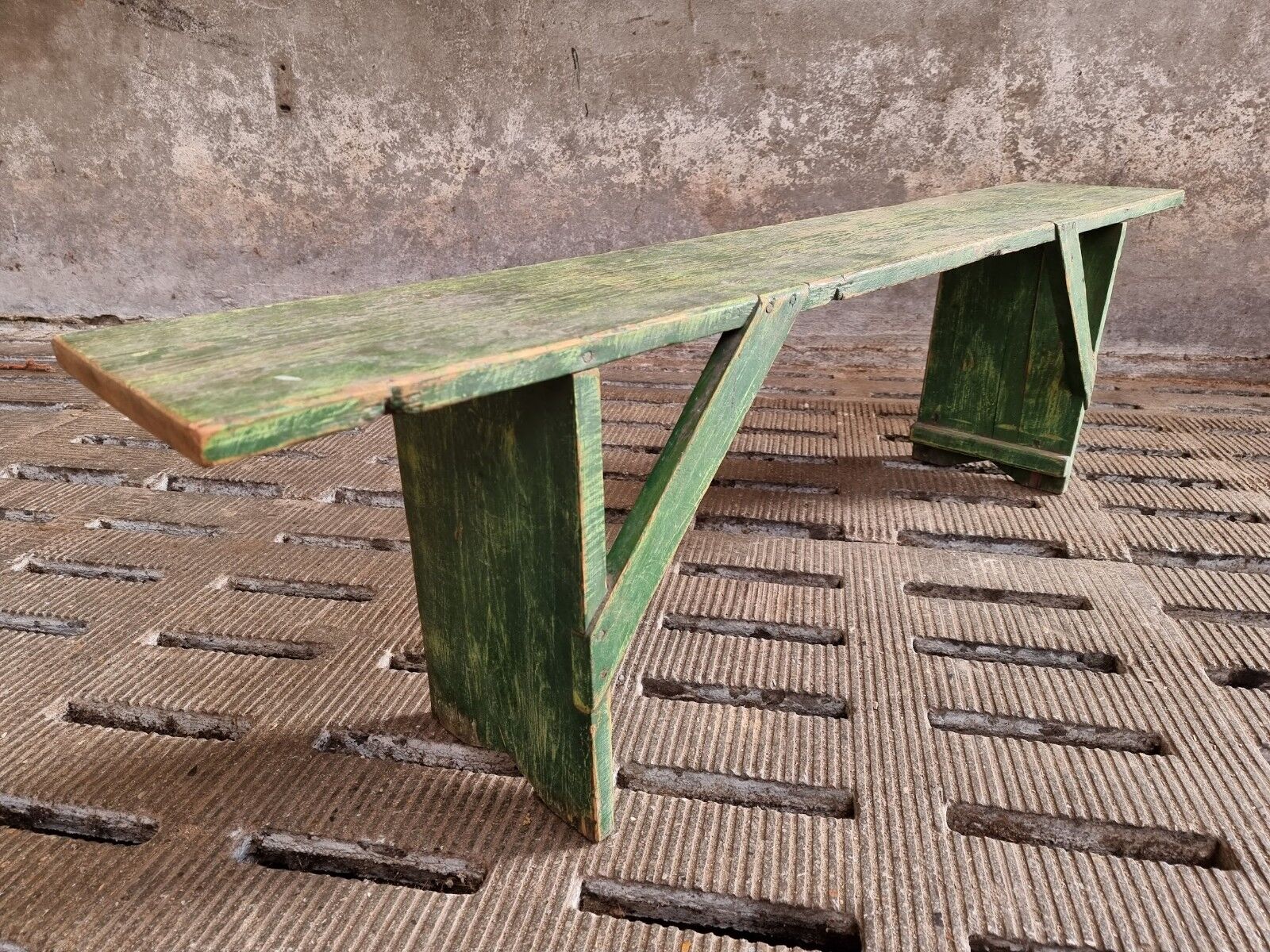 Old wooden bench side table grass green