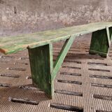 Old wooden bench side table grass green