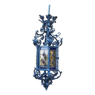Large antique wrought iron lantern with stained glass windows