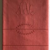 Old linen and cotton sheet in brick red