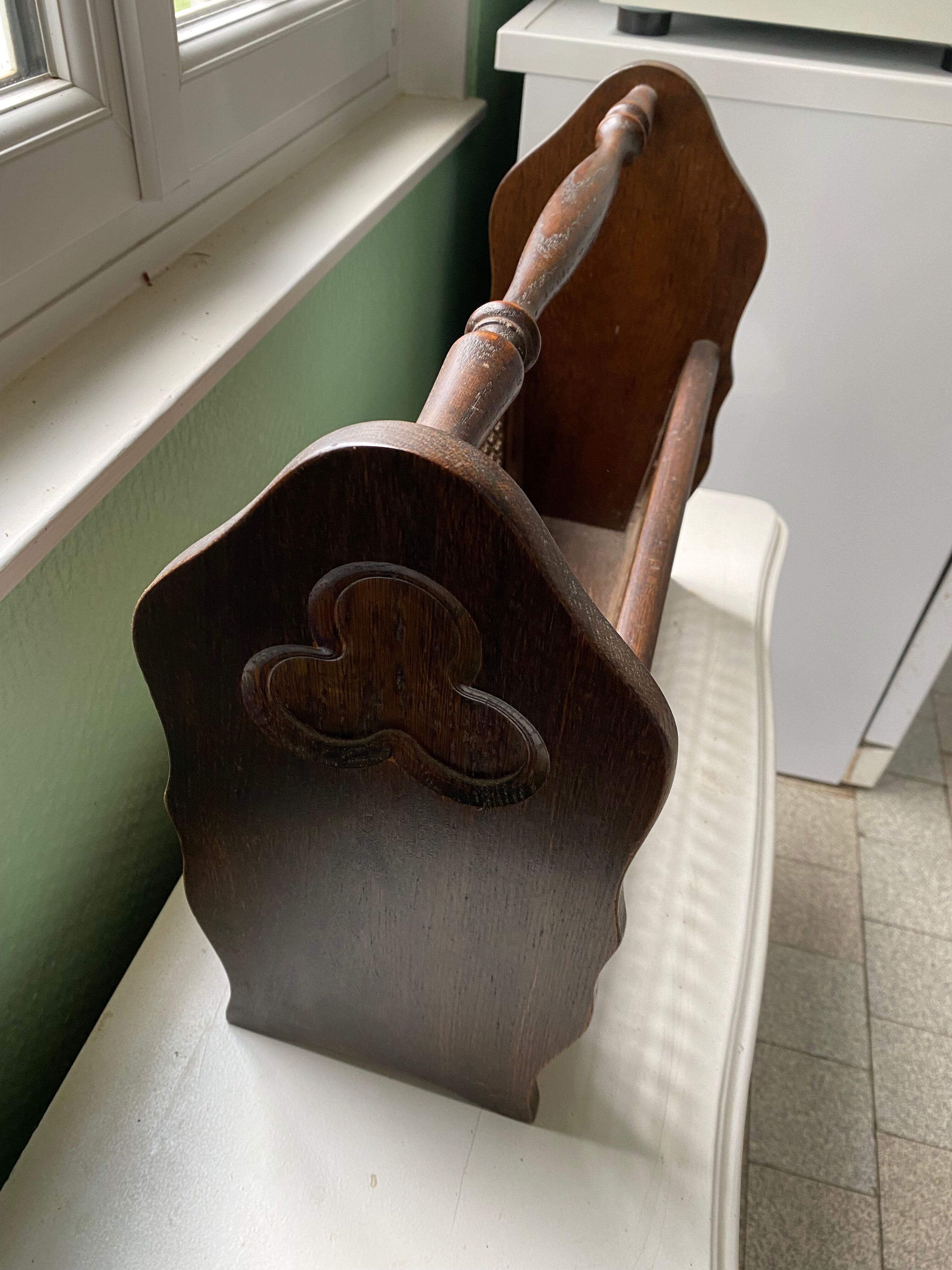 Wooden and cane newspaper rack