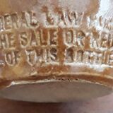 Small pitcher sandstone - 60s/70s - " Federal law forbids dirty. Or reuse of this bottles "