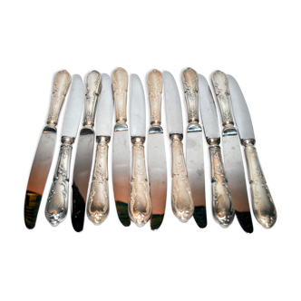Series of 12 vintage table knives in silver metal
